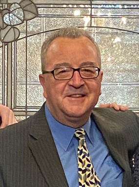 Headshot of Dave Dilger, owner of RSVP Chicago